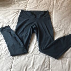 Medium full length high waisted blue Nike leggings